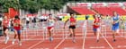Far left No 19 Alicia Barrett (Derby) wins from No 20 Emma Schaanning (Derby) and No 67 Hollie Williamson (Shrop) in the Junior Girls 75 metres Hurdles.